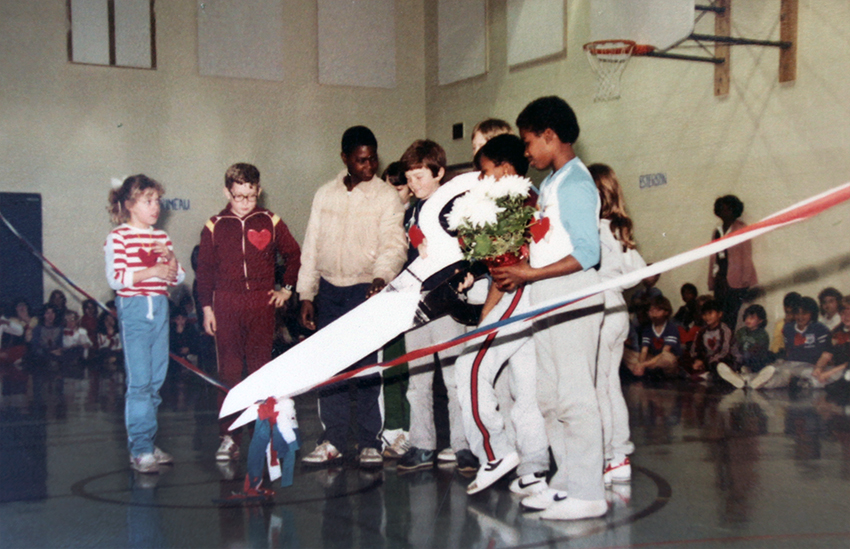 Photograph of a ribbon cutting ceremony in Clermont’s gymnasium.