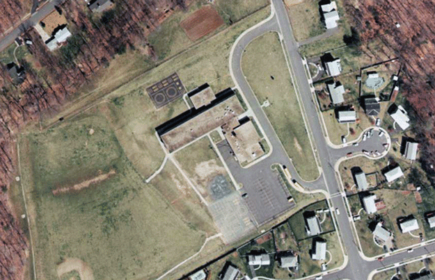 Aerial photographs of the Clermont Elementary School site taken in 1937 and 1976.
