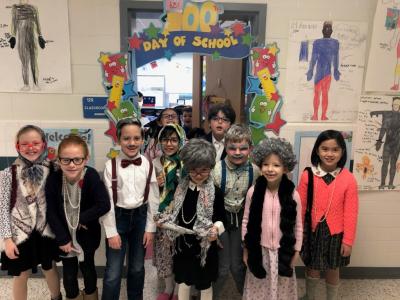 Students dressed up as older people
