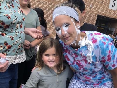 Mrs. Casey with her student who pied her.