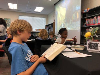 Students reading books in the library