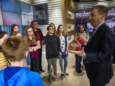 Students listening to Chuck Todd